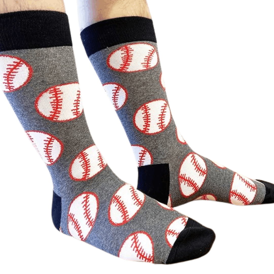 Gray socks with baseball pattern worn by a person on a white background