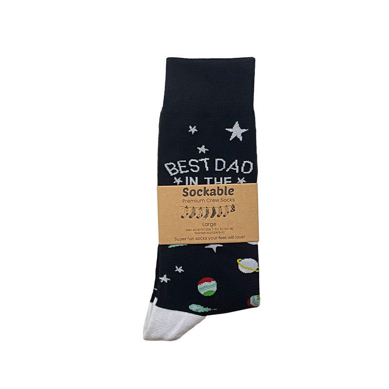 Best Dad in the Universe socks labelled with recycled card ready for gifting or fundraising