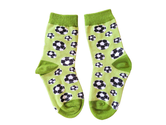 Green kids socks with soccer ball design laid flat