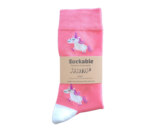 Pink socks with unicorn design and 'Sockable' label on a white background