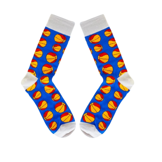 Blue socks with grey trim featuring orange basketballs laid flat on white background