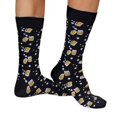 Black socks featuring beer steins and bubbles worn by model