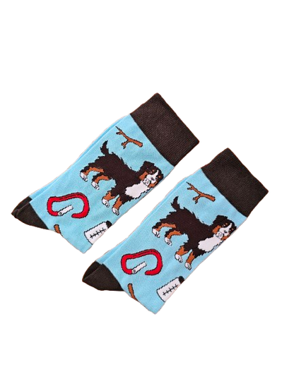 Hiking dog socks folded in half laid flat