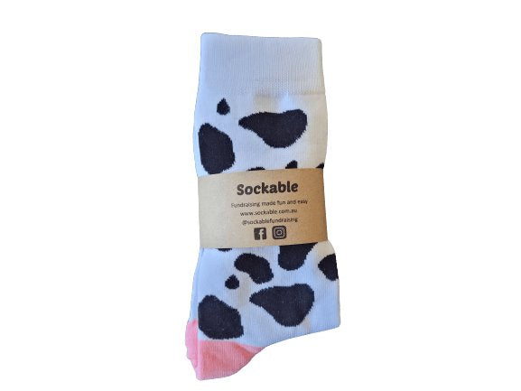 Black and white cow socks with label
