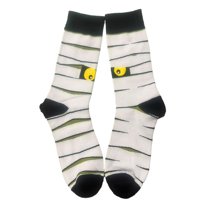 Mummy-themed socks with black eyes on a white background