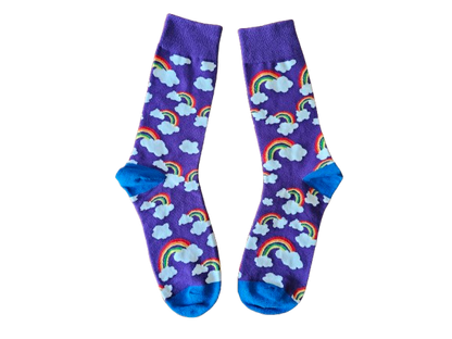 Pair of socks with rainbow and cloud pattern on a purple background