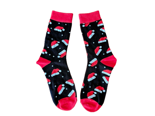 Pair of socks with Santa hats  on a black background