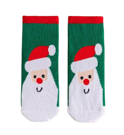 Green socks with red trim and Santa face laid flat