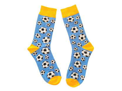 Blue and yellow socks with soccer ball print laid flat