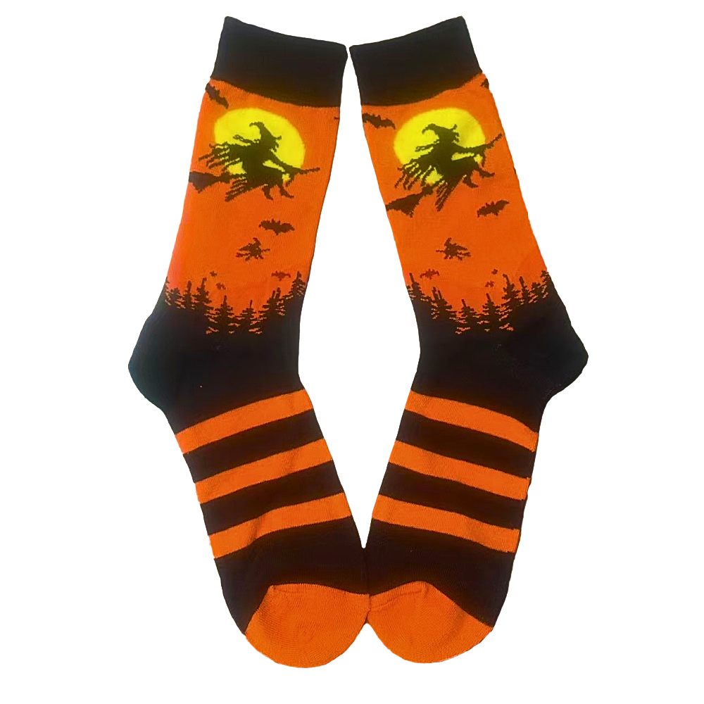 Halloween-themed socks with witch on broom design on an orange background