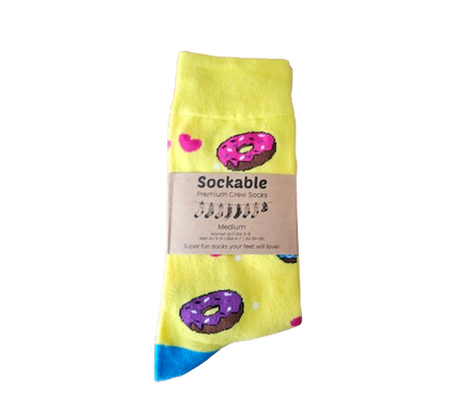 Yellow donut socks with recycled card label ready for gifting or fundraising